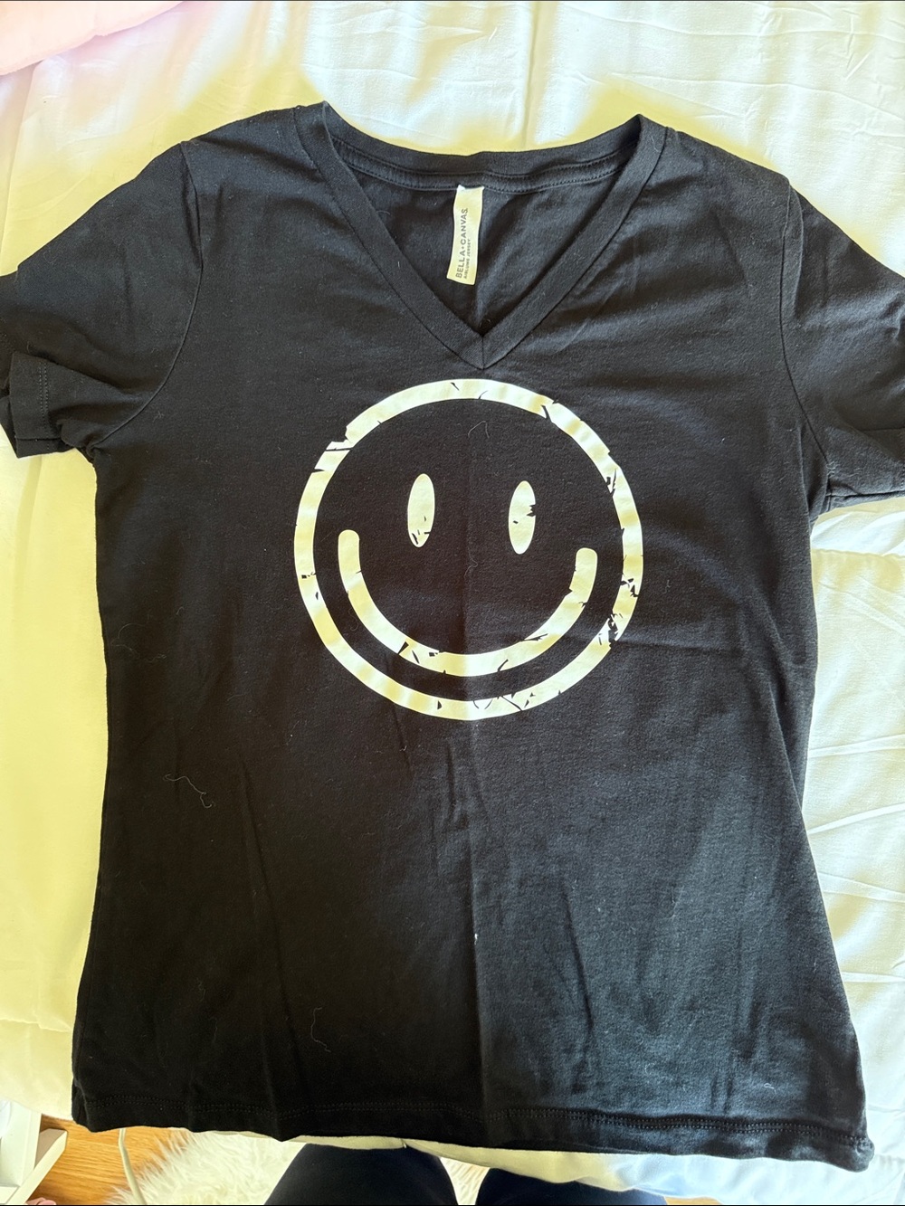 Black V-Neck Tee with White Smiley Graphic